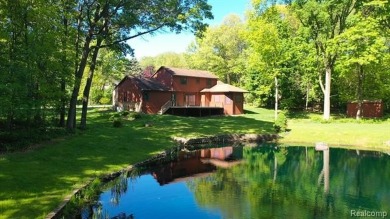 Immaculate one-owner home on 2.75 Acres with a delightful on Shepherds Hollow Golf Club in Michigan - for sale on GolfHomes.com, golf home, golf lot