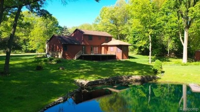 Immaculate one-owner home on 2.75 Acres with a delightful on Shepherds Hollow Golf Club in Michigan - for sale on GolfHomes.com, golf home, golf lot