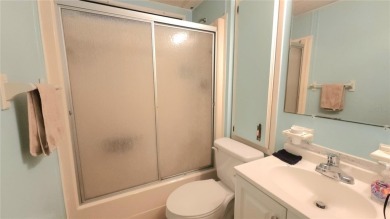 DOUBLE WIDE MOBILE HOME in active 55+ community. FIXER-UPPER IS on River Run Golf Links in Florida - for sale on GolfHomes.com, golf home, golf lot