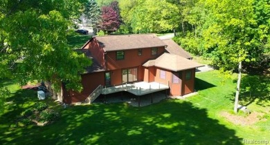 Immaculate one-owner home on 2.75 Acres with a delightful on Shepherds Hollow Golf Club in Michigan - for sale on GolfHomes.com, golf home, golf lot