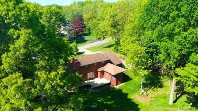 Immaculate one-owner home on 2.75 Acres with a delightful on Shepherds Hollow Golf Club in Michigan - for sale on GolfHomes.com, golf home, golf lot
