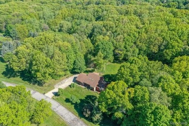 Immaculate one-owner home on 2.75 Acres with a delightful on Shepherds Hollow Golf Club in Michigan - for sale on GolfHomes.com, golf home, golf lot