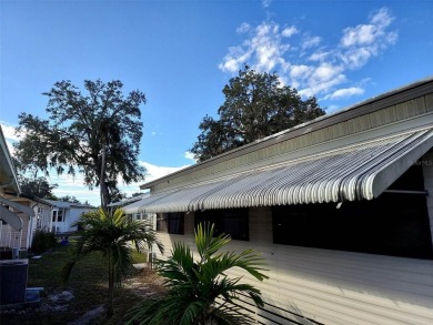 DOUBLE WIDE MOBILE HOME in active 55+ community. FIXER-UPPER IS on River Run Golf Links in Florida - for sale on GolfHomes.com, golf home, golf lot
