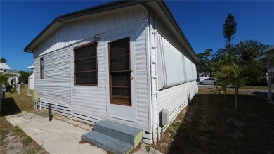 DOUBLE WIDE MOBILE HOME in active 55+ community. FIXER-UPPER IS on River Run Golf Links in Florida - for sale on GolfHomes.com, golf home, golf lot