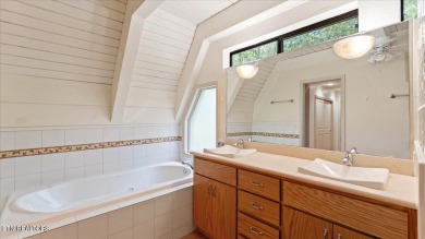 Experience the best of both worlds--mountain vistas and golf on Druid Hills Golf Club in Tennessee - for sale on GolfHomes.com, golf home, golf lot