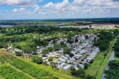 DOUBLE WIDE MOBILE HOME in active 55+ community. FIXER-UPPER IS on River Run Golf Links in Florida - for sale on GolfHomes.com, golf home, golf lot