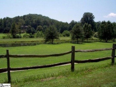Great building lot in a golf course neighborhood with community on The Rock At Jocassee in South Carolina - for sale on GolfHomes.com, golf home, golf lot