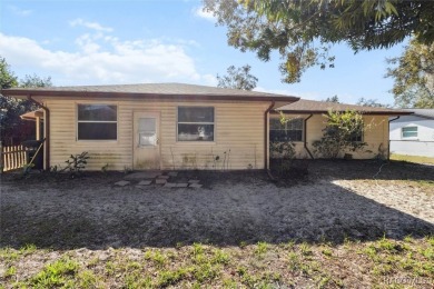 Welcome home! This delightful 3-bedroom, 2-bathroom, and 1-car on Citrus Springs Country Club in Florida - for sale on GolfHomes.com, golf home, golf lot