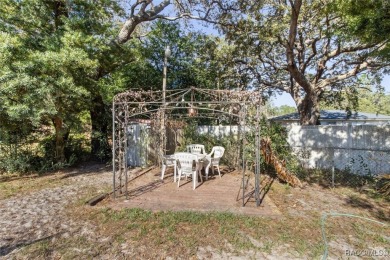 Welcome home! This delightful 3-bedroom, 2-bathroom, and 1-car on Citrus Springs Country Club in Florida - for sale on GolfHomes.com, golf home, golf lot