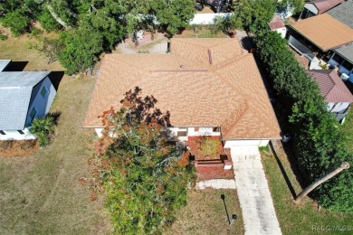 Welcome home! This delightful 3-bedroom, 2-bathroom, and 1-car on Citrus Springs Country Club in Florida - for sale on GolfHomes.com, golf home, golf lot