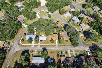 Welcome home! This delightful 3-bedroom, 2-bathroom, and 1-car on Citrus Springs Country Club in Florida - for sale on GolfHomes.com, golf home, golf lot