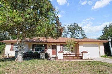 Welcome home! This delightful 3-bedroom, 2-bathroom, and 1-car on Citrus Springs Country Club in Florida - for sale on GolfHomes.com, golf home, golf lot