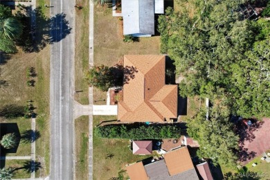 Welcome home! This delightful 3-bedroom, 2-bathroom, and 1-car on Citrus Springs Country Club in Florida - for sale on GolfHomes.com, golf home, golf lot