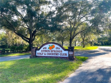 Welcome home! This delightful 3-bedroom, 2-bathroom, and 1-car on Citrus Springs Country Club in Florida - for sale on GolfHomes.com, golf home, golf lot