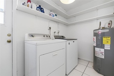 Welcome to this single-family home in Paradise Gardens IV in on Oriole Golf and Tennis Club in Florida - for sale on GolfHomes.com, golf home, golf lot