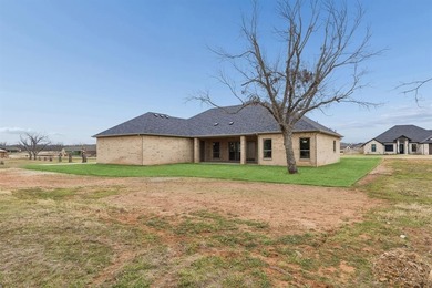 Built by Matteson Homes, this new construction home offers on Pecan Plantation Country Club in Texas - for sale on GolfHomes.com, golf home, golf lot