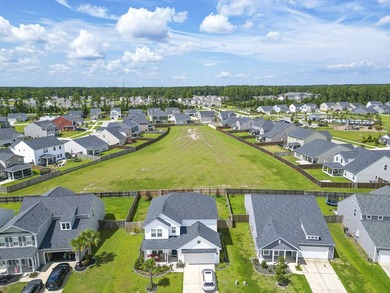 Stunning pond-front living awaits in this move-in-ready 4BR home on Cypress Point Par 3 in South Carolina - for sale on GolfHomes.com, golf home, golf lot