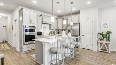 This beautiful 4 BR/3.5BA townhome in the Townes at Barefoot is on Barefoot Resort and Golf Club  in South Carolina - for sale on GolfHomes.com, golf home, golf lot