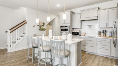 This beautiful 4 BR/3.5BA townhome in the Townes at Barefoot is on Barefoot Resort and Golf Club  in South Carolina - for sale on GolfHomes.com, golf home, golf lot