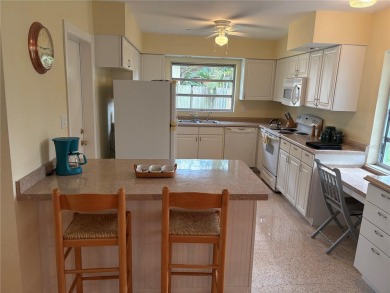 Welcome to this spacious move in ready home in one of the best on The Dunedin Country Club in Florida - for sale on GolfHomes.com, golf home, golf lot