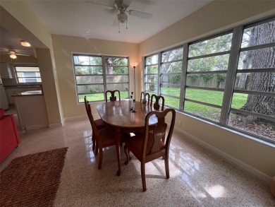 Welcome to this spacious move in ready home in one of the best on The Dunedin Country Club in Florida - for sale on GolfHomes.com, golf home, golf lot