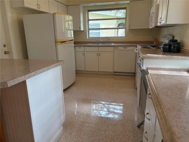 Welcome to this spacious move in ready home in one of the best on The Dunedin Country Club in Florida - for sale on GolfHomes.com, golf home, golf lot