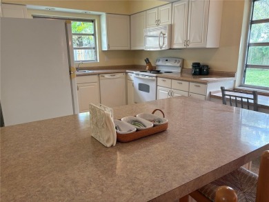 Welcome to this spacious move in ready home in one of the best on The Dunedin Country Club in Florida - for sale on GolfHomes.com, golf home, golf lot