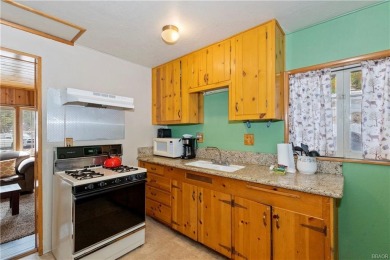 Ideally situated within walking distance to Bear Mountain Ski on Big Bear Mountain Ski and Golf Resort in California - for sale on GolfHomes.com, golf home, golf lot