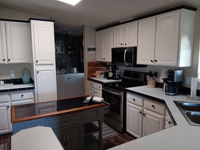 Discover Carefree Living in the highly esteemed Four Lakes Golf on Four Lakes Golf Club in Florida - for sale on GolfHomes.com, golf home, golf lot