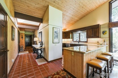 Welcome to a unique blend of tranquil mountain living and on Fox Acres Country Club in Colorado - for sale on GolfHomes.com, golf home, golf lot