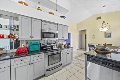 Well maintained 2 bed, 2 1/2 bath + DEN home With peaceful golf on Martin Downs Country Club in Florida - for sale on GolfHomes.com, golf home, golf lot