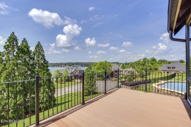 Spacious Tudor-Style Lakefront Home in Gated Golf Community

 on Wind River Golf Course in Tennessee - for sale on GolfHomes.com, golf home, golf lot