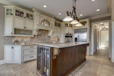 Spacious Tudor-Style Lakefront Home in Gated Golf Community

 on Wind River Golf Course in Tennessee - for sale on GolfHomes.com, golf home, golf lot