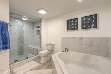Resort Style Living Everyday in this immaculately remodeled on Harbour Village Golf and Yacht Club in Florida - for sale on GolfHomes.com, golf home, golf lot