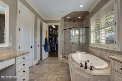 Spacious Tudor-Style Lakefront Home in Gated Golf Community

 on Wind River Golf Course in Tennessee - for sale on GolfHomes.com, golf home, golf lot