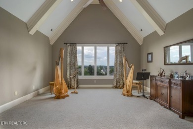 Spacious Tudor-Style Lakefront Home in Gated Golf Community

 on Wind River Golf Course in Tennessee - for sale on GolfHomes.com, golf home, golf lot