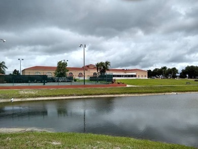 Discover Carefree Living in the highly esteemed Four Lakes Golf on Four Lakes Golf Club in Florida - for sale on GolfHomes.com, golf home, golf lot