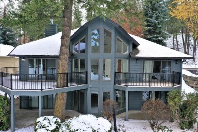 Bask in panoramic views of the Swan Mountain range & the on Eagle Bend Golf Course in Montana - for sale on GolfHomes.com, golf home, golf lot