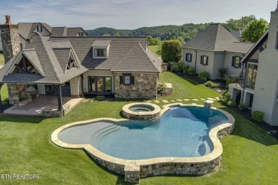 Spacious Tudor-Style Lakefront Home in Gated Golf Community

 on Wind River Golf Course in Tennessee - for sale on GolfHomes.com, golf home, golf lot
