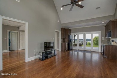 Spacious Tudor-Style Lakefront Home in Gated Golf Community Step on Wind River Golf Course in Tennessee - for sale on GolfHomes.com, golf home, golf lot