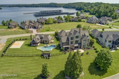 Spacious Tudor-Style Lakefront Home in Gated Golf Community Step on Wind River Golf Course in Tennessee - for sale on GolfHomes.com, golf home, golf lot