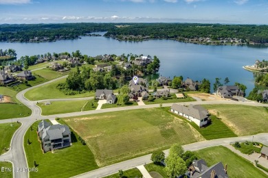 Spacious Tudor-Style Lakefront Home in Gated Golf Community Step on Wind River Golf Course in Tennessee - for sale on GolfHomes.com, golf home, golf lot