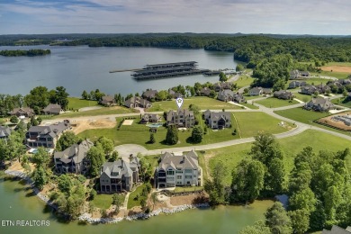 Spacious Tudor-Style Lakefront Home in Gated Golf Community Step on Wind River Golf Course in Tennessee - for sale on GolfHomes.com, golf home, golf lot