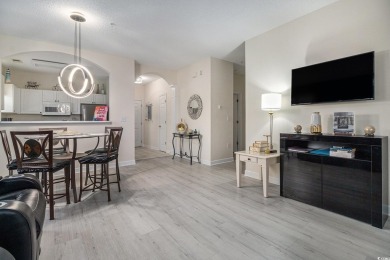 This beautifully updated, light-filled 2-bedroom, 2-bathroom on Barefoot Resort and Golf Club  in South Carolina - for sale on GolfHomes.com, golf home, golf lot