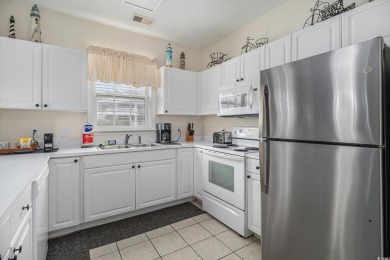 This beautifully updated, light-filled 2-bedroom, 2-bathroom on Barefoot Resort and Golf Club  in South Carolina - for sale on GolfHomes.com, golf home, golf lot
