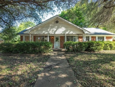 This three-bedroom, two-bathroom home is brimming with potential on Hillsboro Country Club in Texas - for sale on GolfHomes.com, golf home, golf lot