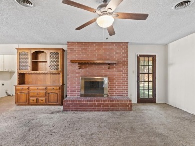 This three-bedroom, two-bathroom home is brimming with potential on Hillsboro Country Club in Texas - for sale on GolfHomes.com, golf home, golf lot