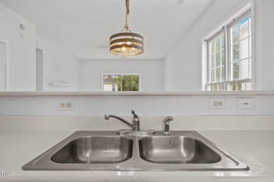 Welcome to this affordable 2-bedroom, 1.5-bath townhome in a on Hedingham Golf and Athletic Club in North Carolina - for sale on GolfHomes.com, golf home, golf lot