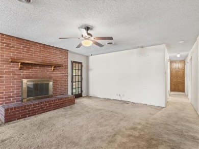 This three-bedroom, two-bathroom home is brimming with potential on Hillsboro Country Club in Texas - for sale on GolfHomes.com, golf home, golf lot