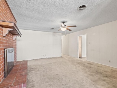 This three-bedroom, two-bathroom home is brimming with potential on Hillsboro Country Club in Texas - for sale on GolfHomes.com, golf home, golf lot
